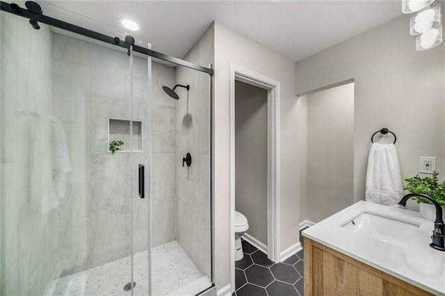 1282 Westridge Rd SW, Atlanta, GA 30311 - full bathroom with tile patterned flooring, a shower stall, baseboards, toilet, and vanity
