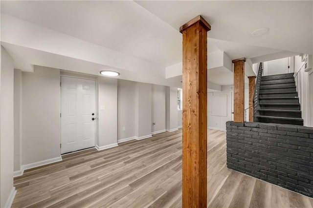 1282 Westridge Rd SW, Atlanta, GA 30311 - finished below grade area with stairs, baseboards, and wood finished floors