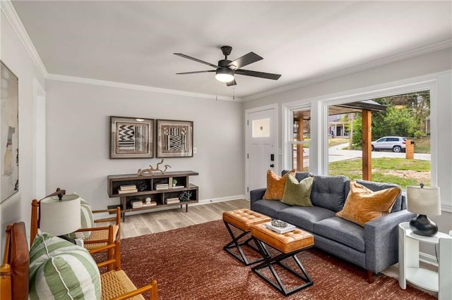 1282 Westridge Rd SW, Atlanta, GA 30311 - living area featuring ornamental molding, baseboards, ceiling fan, and wood finished floors