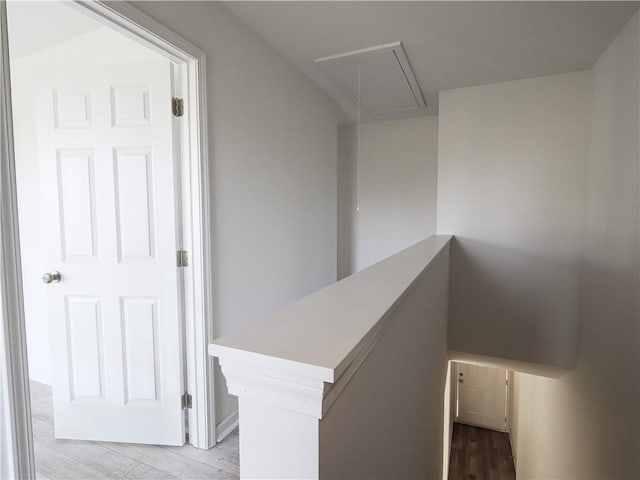 corridor featuring light hardwood / wood-style floors