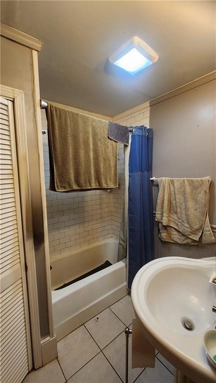 1171 Goodwin Rd NE, Atlanta, GA 30324 - full bathroom featuring shower / bath combination with curtain and tile patterned flooring