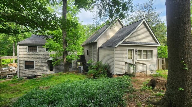 1171 Goodwin Rd NE, Atlanta, GA 30324 - rear view of property with roof with shingles