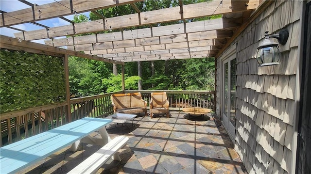 1171 Goodwin Rd NE, Atlanta, GA 30324 - view of patio / terrace with a pergola and an outdoor living space