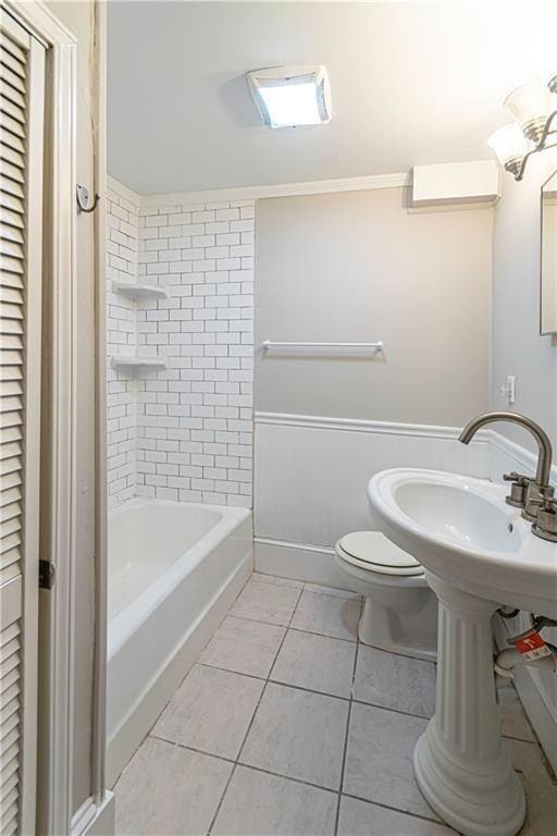 1171 Goodwin Rd NE, Atlanta, GA 30324 - bathroom with tile patterned floors, a closet, and shower / bathtub combination