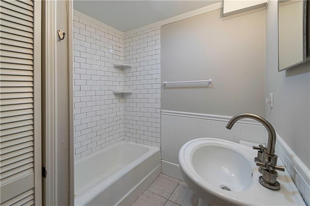 1171 Goodwin Rd NE, Atlanta, GA 30324 - full bathroom featuring tile patterned floors, bathtub / shower combination, ornamental molding, and wainscoting