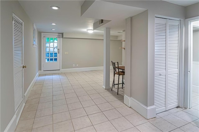 1171 Goodwin Rd NE, Atlanta, GA 30324 - foyer with light tile patterned floors and recessed lighting