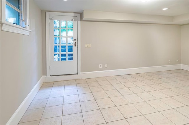 1171 Goodwin Rd NE, Atlanta, GA 30324 - doorway with light tile patterned flooring and recessed lighting