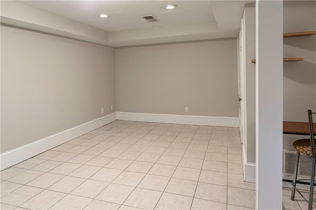 1171 Goodwin Rd NE, Atlanta, GA 30324 - unfurnished room featuring a tray ceiling and recessed lighting