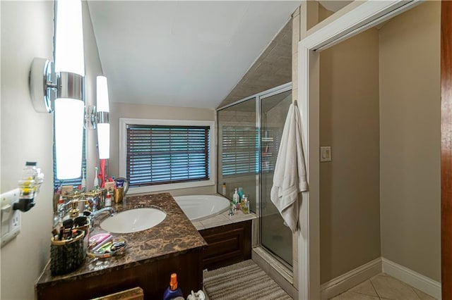 1171 Goodwin Rd NE, Atlanta, GA 30324 - full bathroom featuring a garden tub, vanity, a shower stall, tile patterned floors, and vaulted ceiling