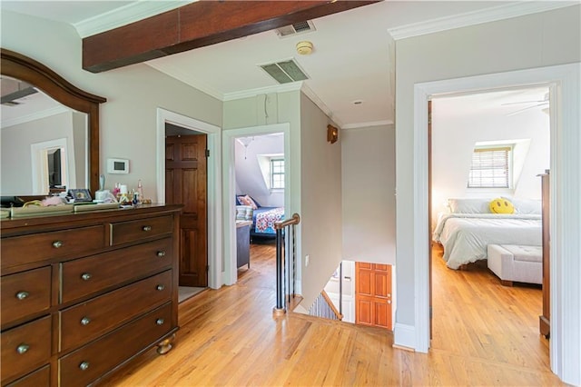 1171 Goodwin Rd NE, Atlanta, GA 30324 - hallway with an upstairs landing, light wood finished floors, healthy amount of natural light, and crown molding