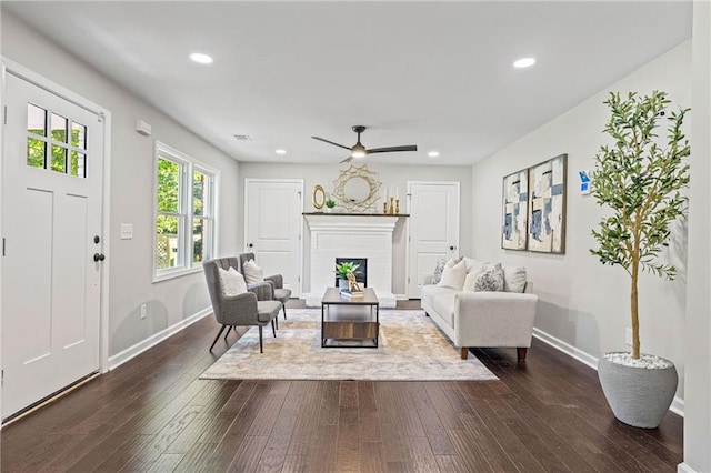 1995 Venetian Dr SW, Atlanta, GA 30311 - living area with baseboards, a fireplace with raised hearth, ceiling fan, dark wood-style flooring, and recessed lighting