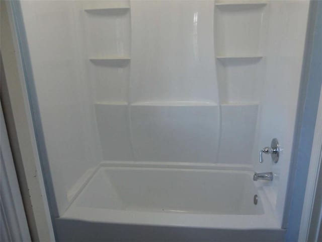 bathroom featuring shower / washtub combination