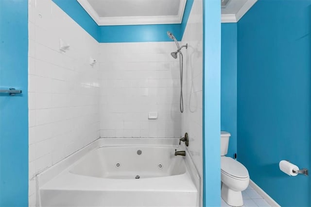 bathroom with toilet, tile patterned floors, ornamental molding, and tiled shower / bath