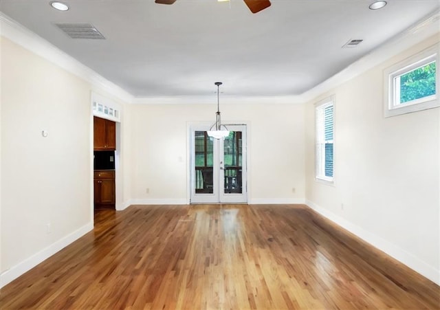 unfurnished room featuring hardwood / wood-style flooring and ceiling fan