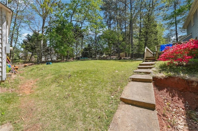 view of yard featuring a deck