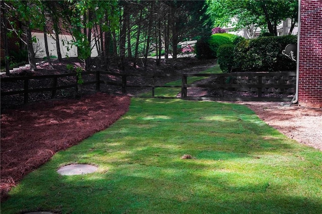 view of yard with fence