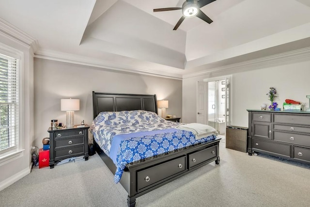 1253 Rivermark Ct, Lawrenceville, GA 30043 - bedroom with carpet floors, a tray ceiling, ornamental molding, ceiling fan, and ensuite bathroom