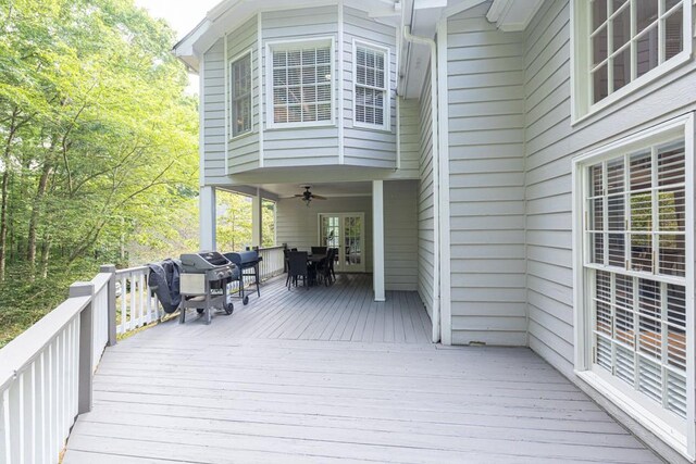 1253 Rivermark Ct, Lawrenceville, GA 30043 - wooden terrace with ceiling fan, outdoor dining area, and a grill