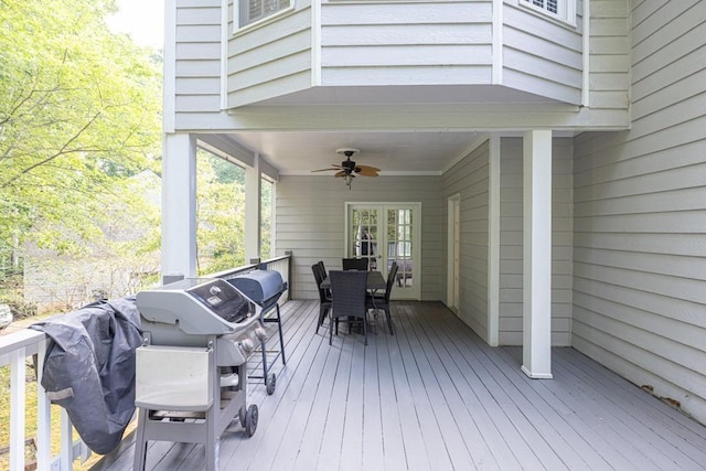 1253 Rivermark Ct, Lawrenceville, GA 30043 - wooden terrace with outdoor dining area, ceiling fan, and a grill