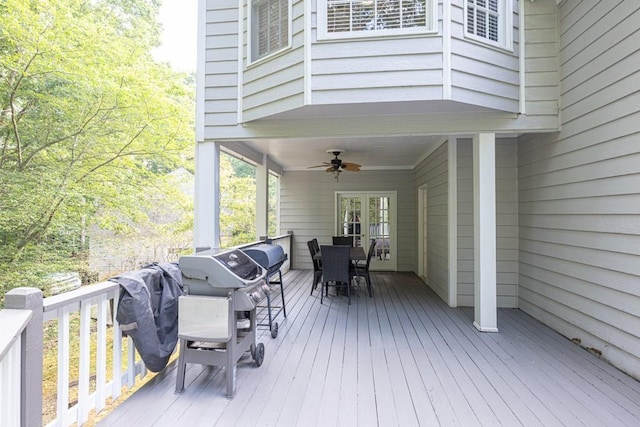 1253 Rivermark Ct, Lawrenceville, GA 30043 - wooden terrace featuring outdoor dining area, ceiling fan, and area for grilling