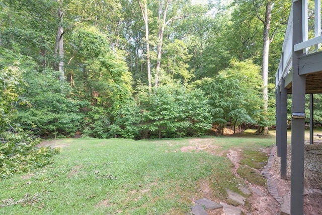1253 Rivermark Ct, Lawrenceville, GA 30043 - view of grassy yard with a view of trees