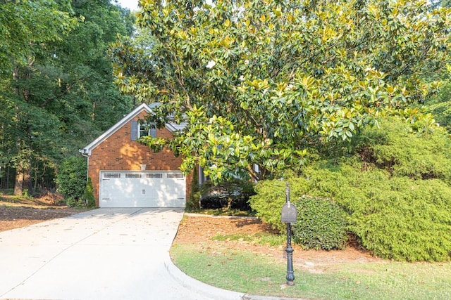 1253 Rivermark Ct, Lawrenceville, GA 30043 - view of front of property featuring concrete driveway and brick siding