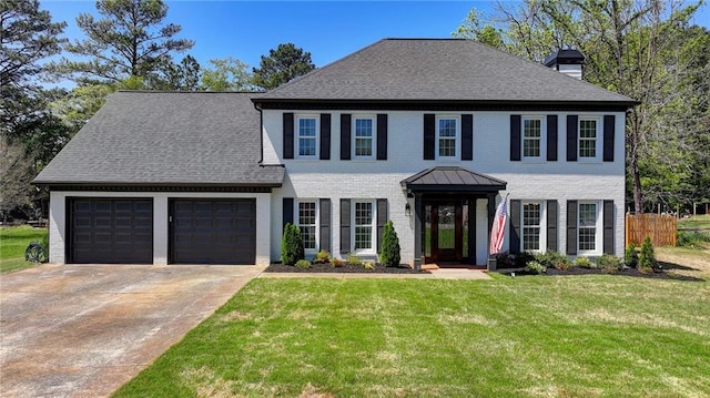 1807 N Chestnut Grove Dr, Marietta, GA 30066 - colonial home featuring an attached garage, concrete driveway, a chimney, brick siding, and a shingled roof
