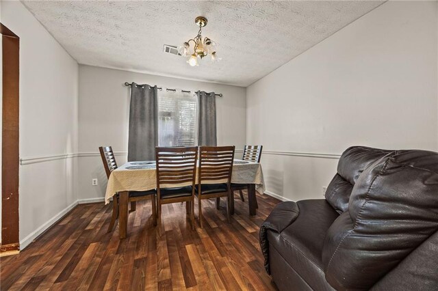 1230 Brook Meadow Ct, Lawrenceville, GA 30045 - dining area with a chandelier, wood finished floors, a textured ceiling, and baseboards