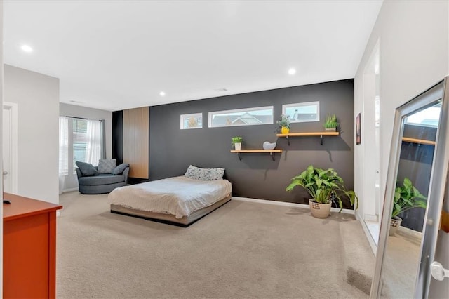 bedroom with recessed lighting, baseboards, and carpet