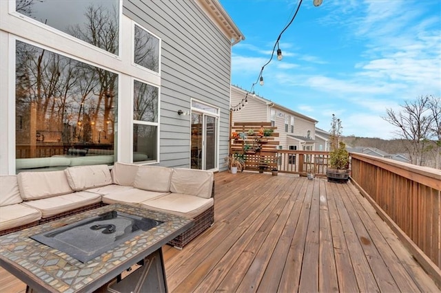 deck featuring an outdoor living space