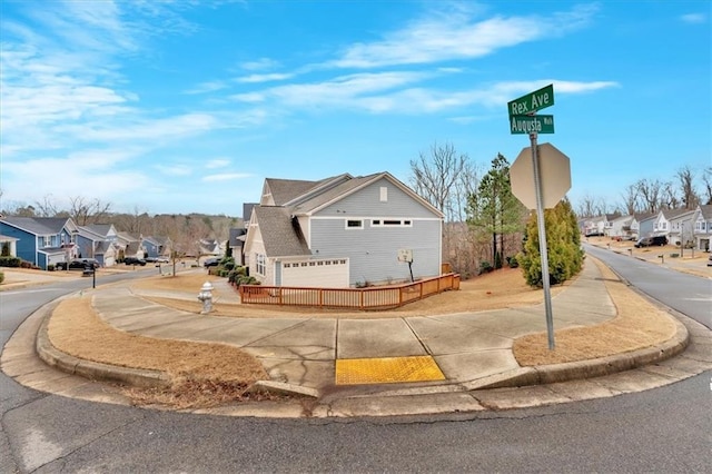 view of property exterior featuring a residential view