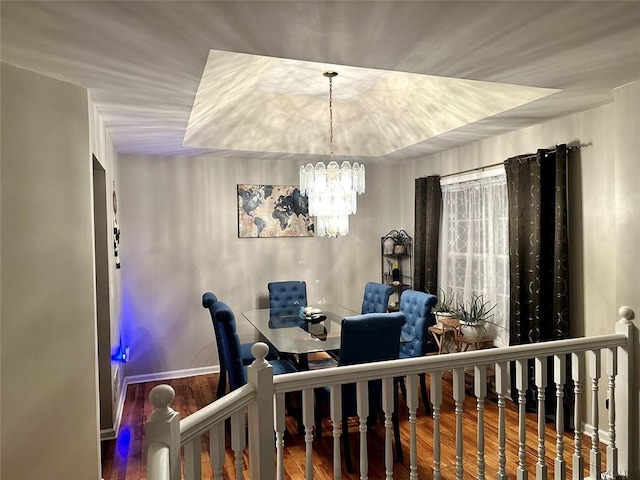 interior space featuring an inviting chandelier and wood-type flooring