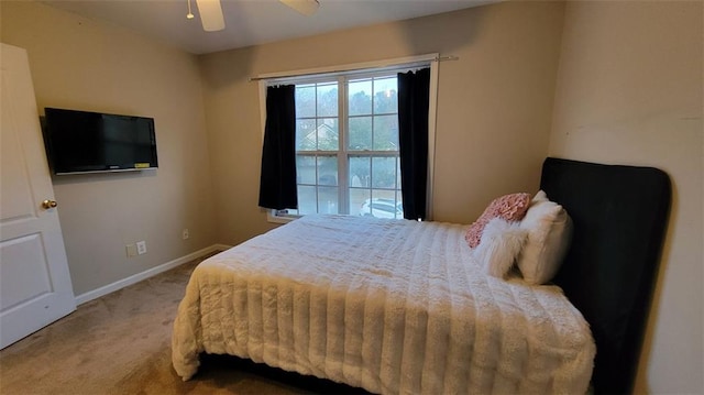 bedroom featuring ceiling fan and carpet floors