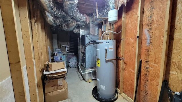 utility room with electric water heater