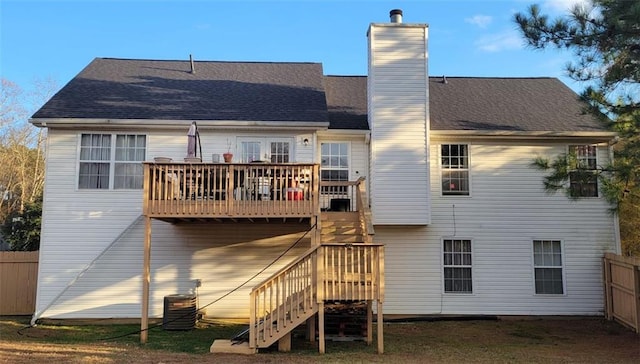 back of property featuring central AC unit