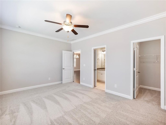 4905 Sterling Close, Buford, GA 30518 - unfurnished bedroom with ornamental molding, a spacious closet, light colored carpet, baseboards, and a closet