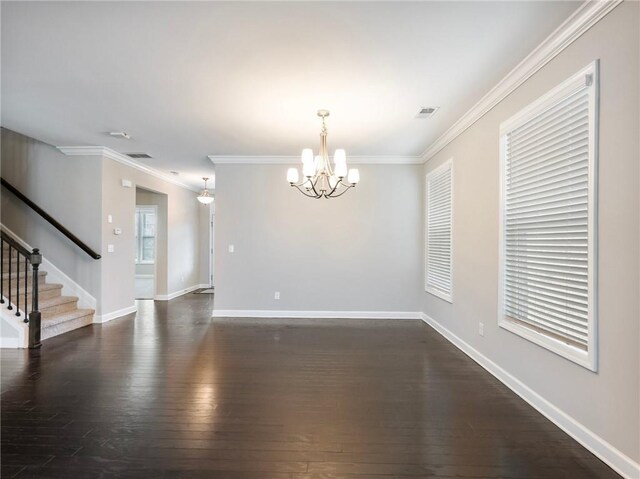 4905 Sterling Close, Buford, GA 30518 - spare room with a chandelier, dark wood-style floors, crown molding, stairs, and baseboards