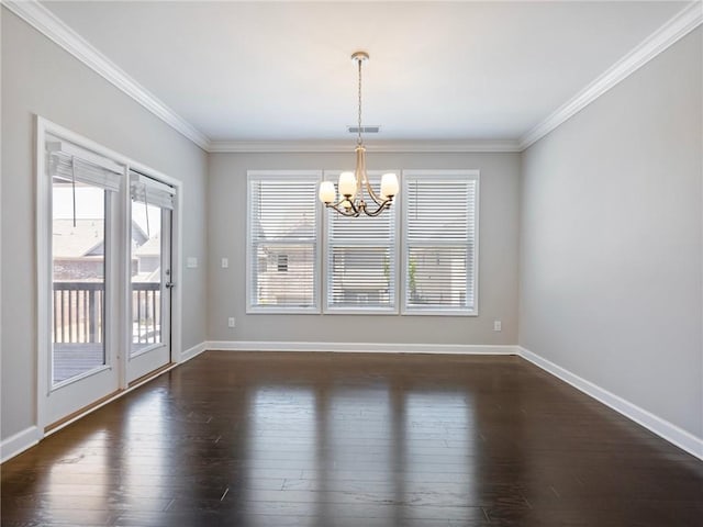 4905 Sterling Close, Buford, GA 30518 - unfurnished dining area with a chandelier, ornamental molding, baseboards, and dark wood finished floors