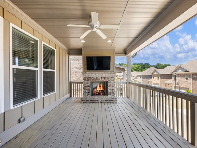4905 Sterling Close, Buford, GA 30518 - deck with an outdoor brick fireplace and ceiling fan