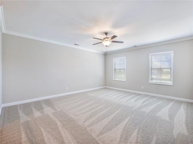 4905 Sterling Close, Buford, GA 30518 - spare room featuring crown molding, baseboards, ceiling fan, and light colored carpet