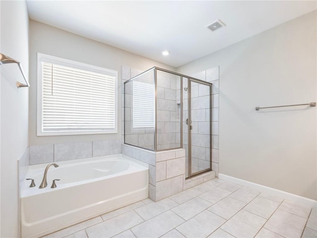 4905 Sterling Close, Buford, GA 30518 - bathroom with tile patterned floors, a garden tub, and a stall shower