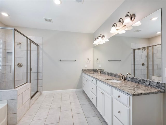 4905 Sterling Close, Buford, GA 30518 - full bath featuring tile patterned floors, a stall shower, double vanity, baseboards, and recessed lighting