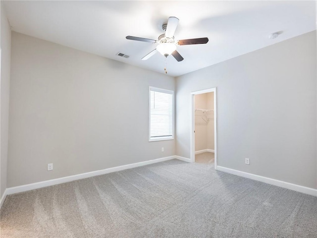 4905 Sterling Close, Buford, GA 30518 - empty room with carpet floors, baseboards, a ceiling fan, and a smoke detector