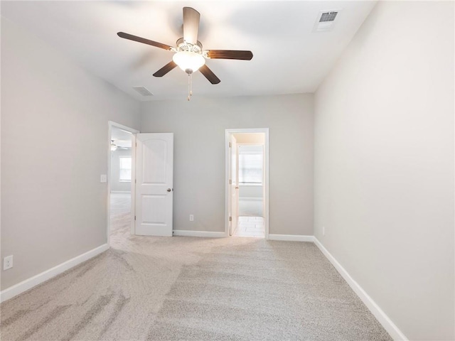 4905 Sterling Close, Buford, GA 30518 - unfurnished bedroom with light colored carpet, baseboards, and connected bathroom