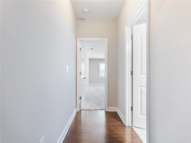4905 Sterling Close, Buford, GA 30518 - hallway with dark wood-style flooring and baseboards