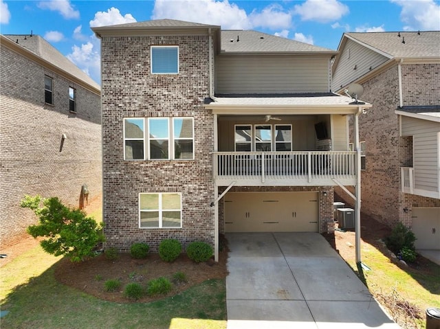 4905 Sterling Close, Buford, GA 30518 - view of front of property with an attached garage, driveway, cooling unit, and brick siding