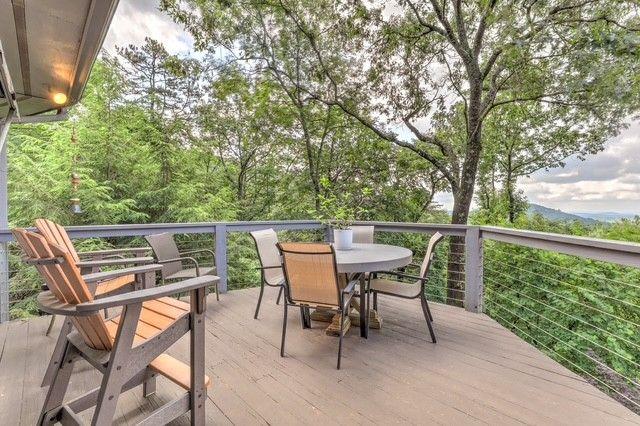 73 Falcon Heights Ln, Big Canoe, GA 30143 - wooden deck with outdoor dining space