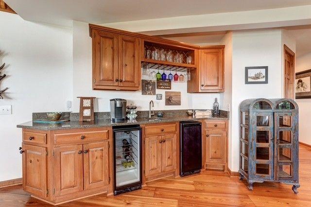 73 Falcon Heights Ln, Big Canoe, GA 30143 - indoor wet bar with beverage cooler and light wood-type flooring