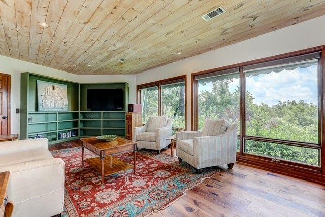 73 Falcon Heights Ln, Big Canoe, GA 30143 - living room featuring wood ceiling and wood finished floors