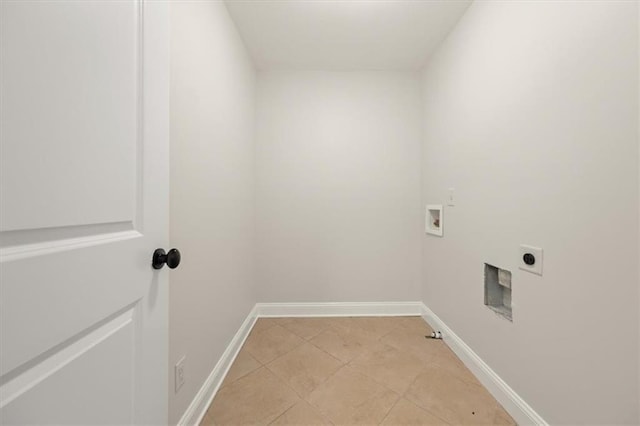 clothes washing area with hookup for a washing machine, hookup for a gas dryer, and electric dryer hookup